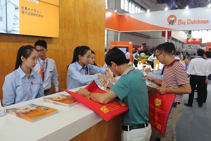 Attendees drop by the Big Dutchman booth at 2016 VIV Beijing